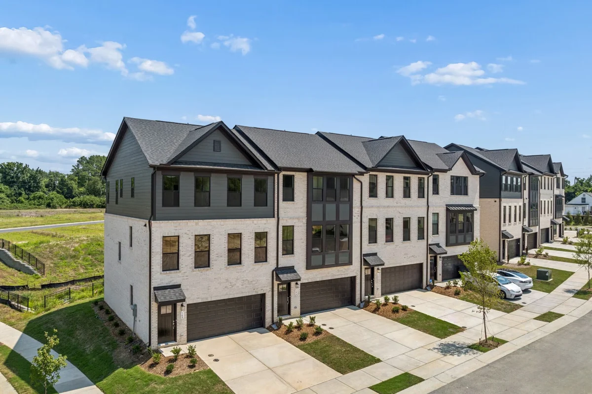 Three-story Midtown Rows townhomes with attached two-car garages